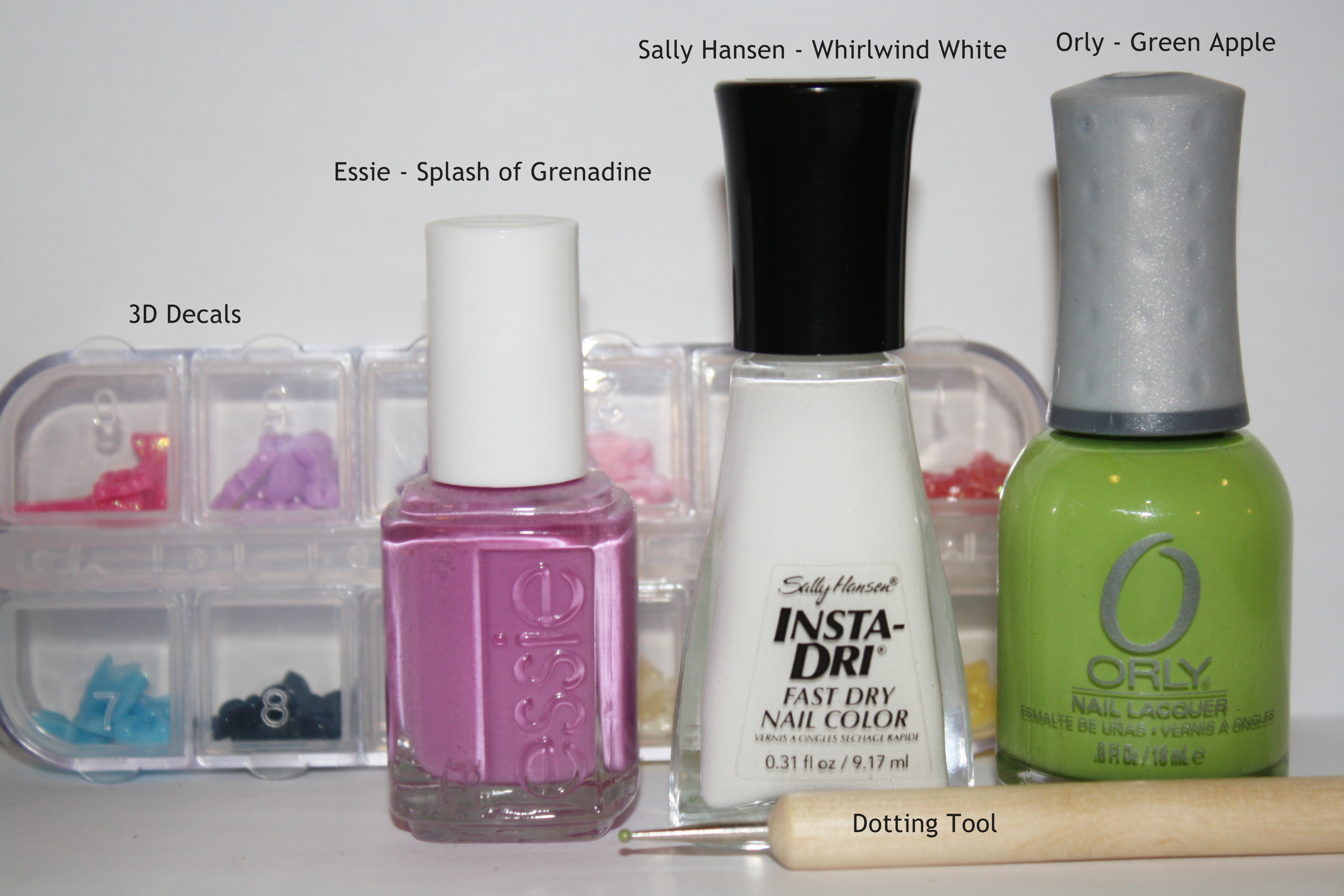Place 3D bright green bows on the base of each nail while the polish is