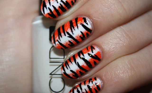 NAIL ART TUTORIAL: EYE OF THE TIGER. Posted by polishyoupretty on 03/07/2012